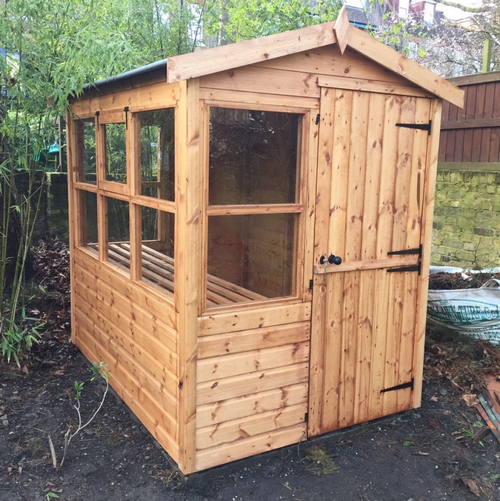 Lean to wooden potting shed